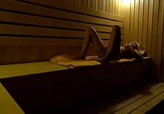 whoa, hidden cam catches this teen fingering wet in sauna 😏