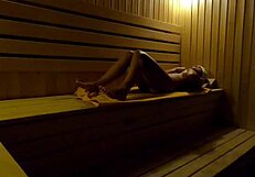 whoa, hidden cam catches this teen fingering wet in sauna 😏