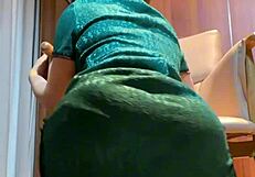 Under the mahjong table, her black stockings tease with dirty footjob talk.