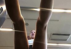 Sweaty gym babe teases her fit body during steamy workout session