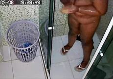 hidden cam catches busty bbw neighbor shaving huge brazilian milf pussy in bath