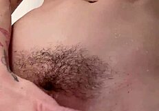redhead babe shakes juicy tits plays pierced pussy shower