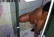 hidden cam catches busty bbw neighbor shaving huge brazilian milf pussy in bath