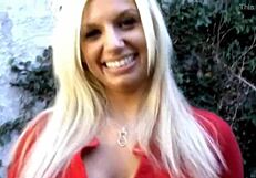 Busted blonde reveals her big tits and pierced nipples up close