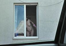 Naked mature milf neighbor washes windows bare pussy exposed as taxi driver peeps big tits!