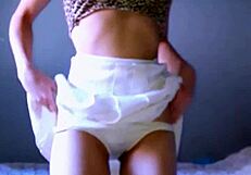 Pretty petite blonde lifts her tight skirt to tease wet pussy in solo homemade play.