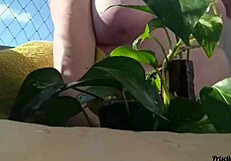 watering my plants totally naked on the balcony for anyone to see - part 02 with big natural tits flashing