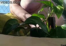 watering my plants totally naked on the balcony for anyone to see - part 02 with big natural tits flashing
