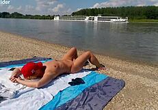Ariela rider shows exhibitionist pussy on the danube bank