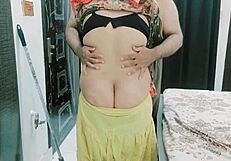 The pakistani housewife prepares dinner for her husband at home