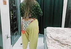 The pakistani housewife prepares dinner for her husband at home
