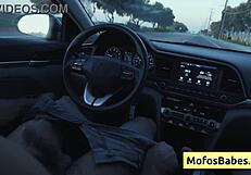 Sexy asian hottie plays with big boobs in car