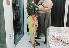 The pakistani housewife prepares dinner for her husband at home