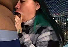 Friend gives blowjob on balcony