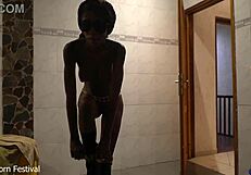 Dolcina is showering her perfect skinny african body in the bathroom now