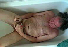 Mature guy wanks his cock on cam