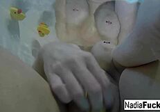 Sexy nadia takes a bath with some rubber duckies