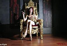 Mistress smoking on her throne