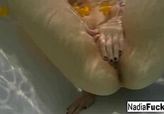 Sexy nadia takes a bath with some rubber duckies