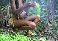 hot african native woman cooking in the jungle