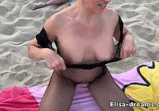 Milf takes bukkake on beach