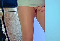 COLLEGE DESI IN SEXY DRESS AND SNEAKERS PLAYS WITH GLASS DILDO