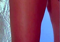COLLEGE DESI IN SEXY DRESS AND SNEAKERS PLAYS WITH GLASS DILDO
