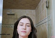 Enchanting brunette beauty took a shower