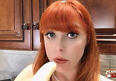 redhead penny pax loves teasing her wet pussy with banana in kitchen