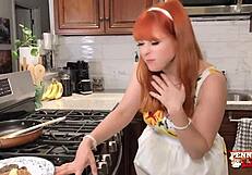 redhead penny pax loves teasing her wet pussy with banana in kitchen