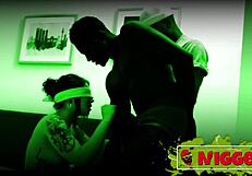 a cute teen enters dark room for interracial threesome fun