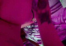 Real couple intimate moment under red lights