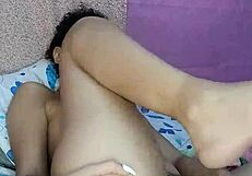 Curly haired latina massages her hairy pussy with vibrator until orgasm