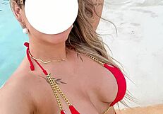 curvy brazilian relaxes poolside wearing tiny bikini