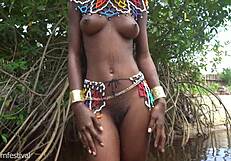 zulu tribe girl shows perfect natural tits in forest