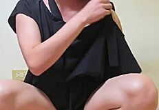 shemale ting xuan masturbates while wearing a sexy dress and high heels