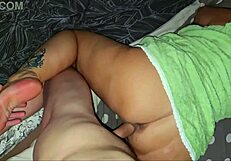 A stepmother in a green robe enjoys her stepson