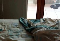 I masturbate on the beach while watching my beautiful stepmother lying on the bed
