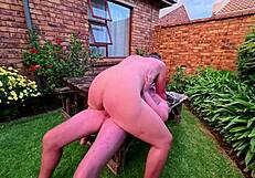 Pawg sucking and riding big dick outside on table