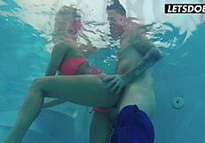 Blonde in a wet bikini sucks his cock at the pool then takes it doggy