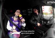 tattooed redhead tempts busty babe into van to fuck her tits