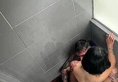 this attractive brunette waits in the shower for a fun time