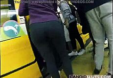 Amazing voyeuristic butts in leather boots are captured by hidden camera
